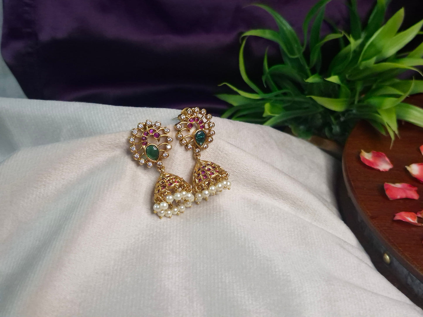 Antique Gold Peacock Jhumka Earrings — Emerald & Ruby AD Stone Open Swirl Top with Pearl Drop Jhumka
