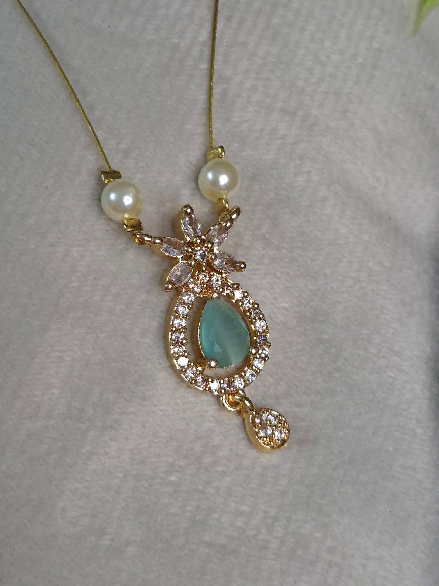 Mint Teardrop CZ Pendant — Pearl & Bead Invisible Chain