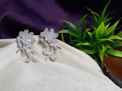 Silver CZ Floral Vine Earrings — Full Pave AD Stone Flower with Scrolling Tendril Drop